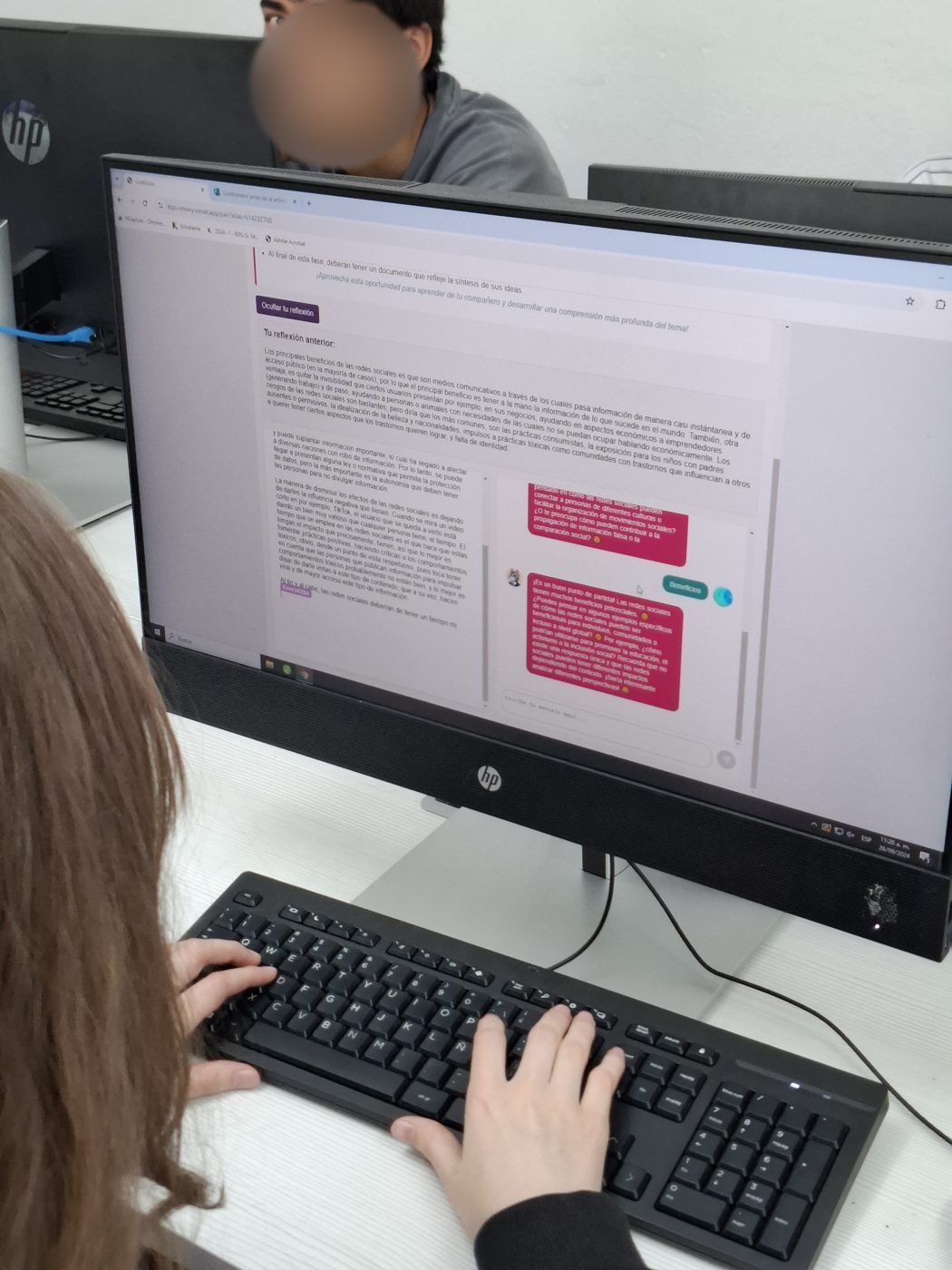 A student using the pair phase with the AI assistant